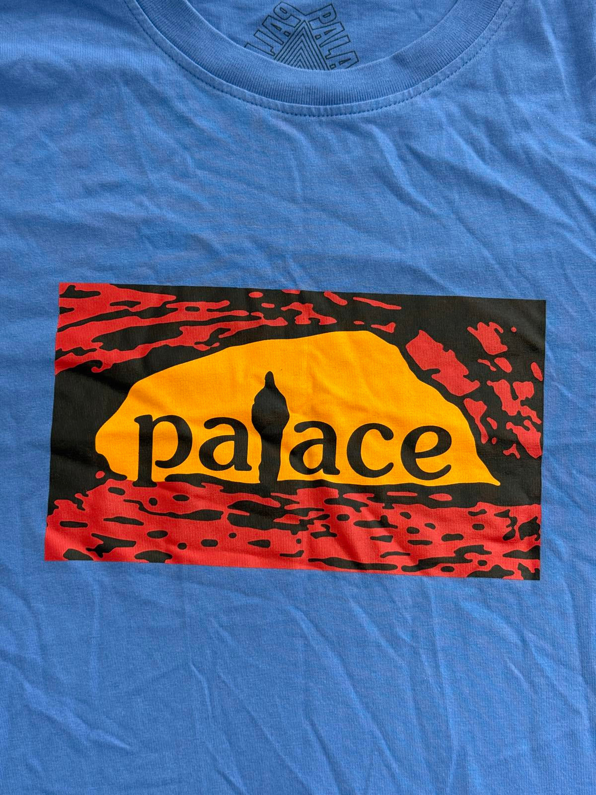 T-shirt Palace Caveman, marque de skate, homme dans une grotte - L