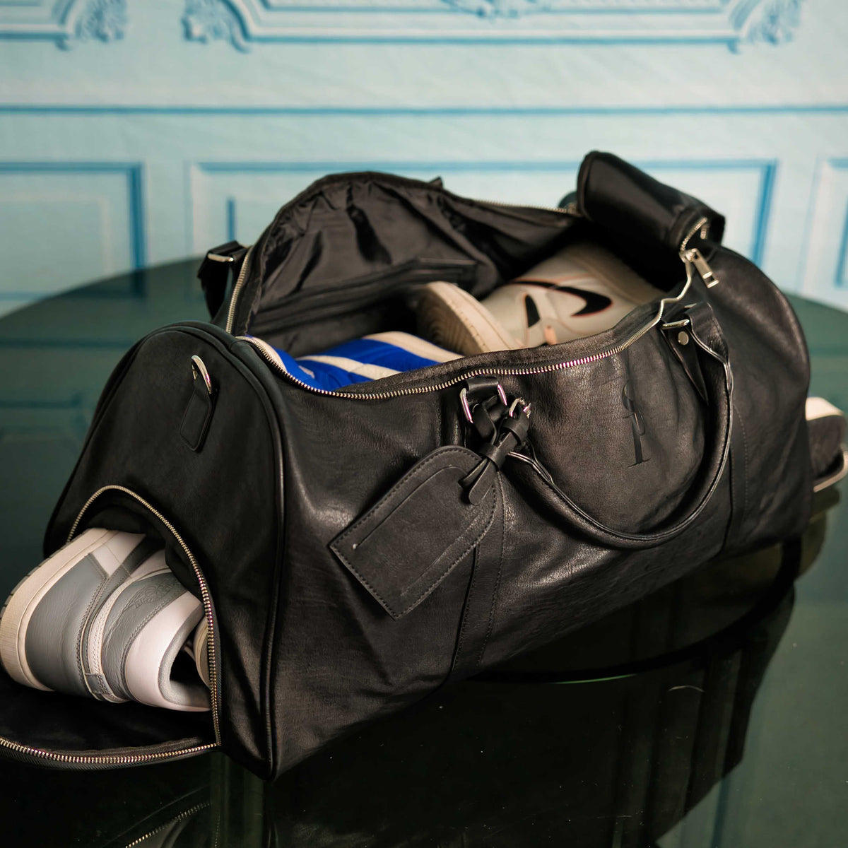 Black Leather Duffel Bag with Dual Shoe Compartments
