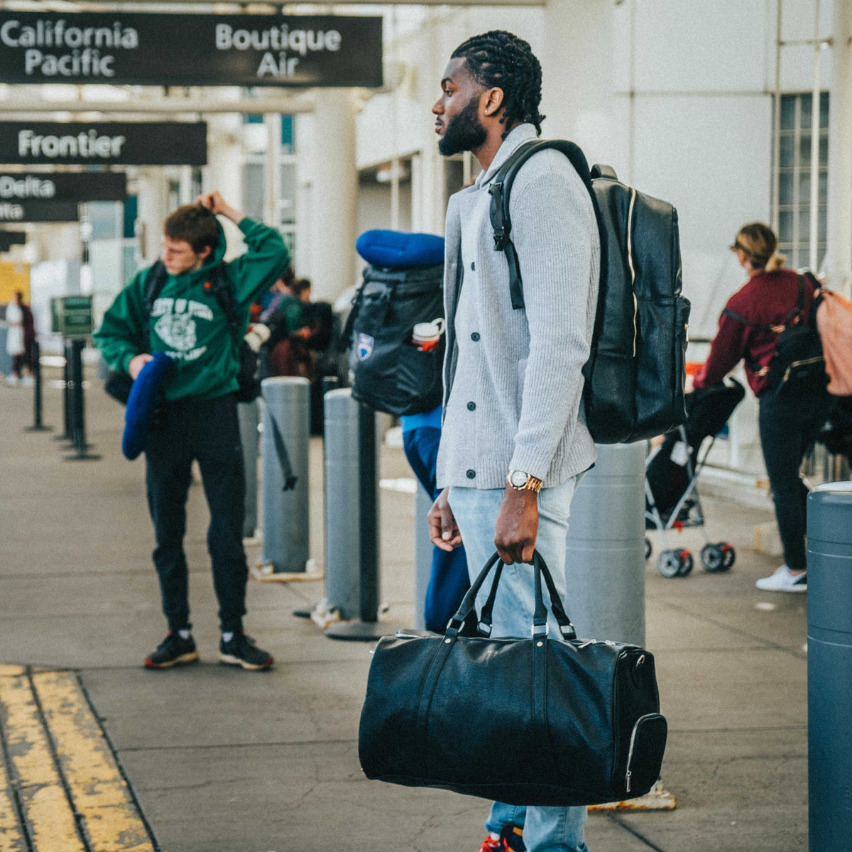 Black Leather Duffel Bag with Dual Shoe Compartments