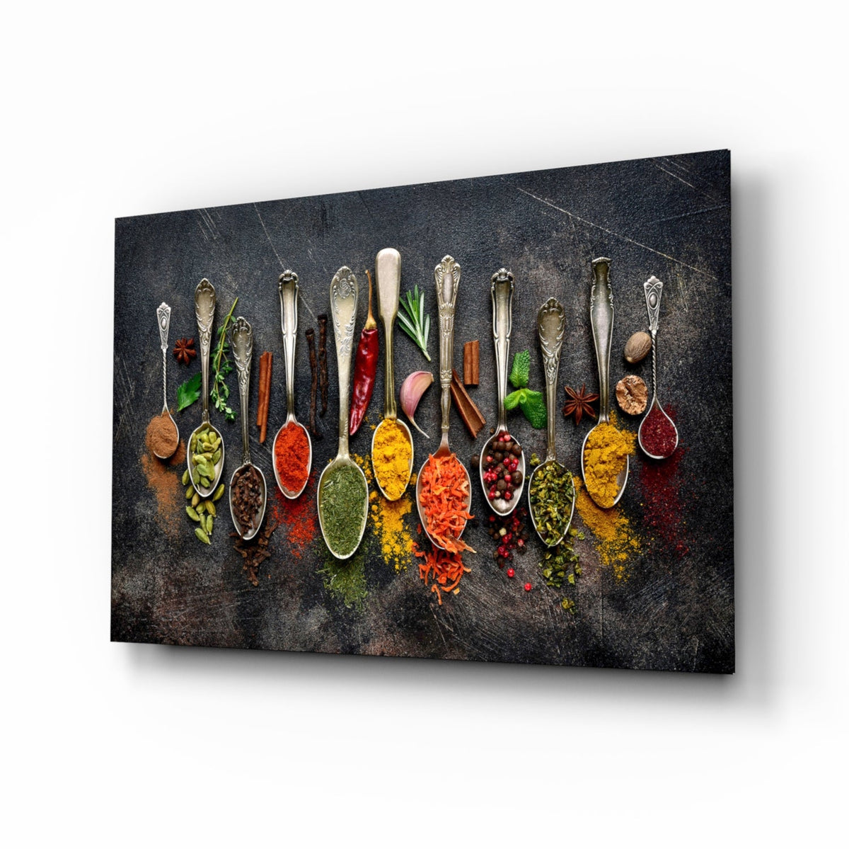 Tableau sur verre Art mural Rangée de cuillères en argent avec épices colorées